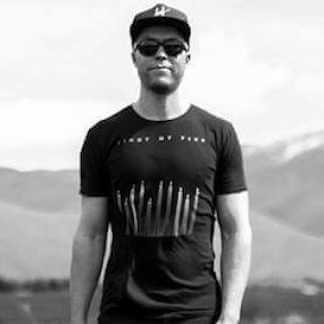 Man wearing black tshirt and hat