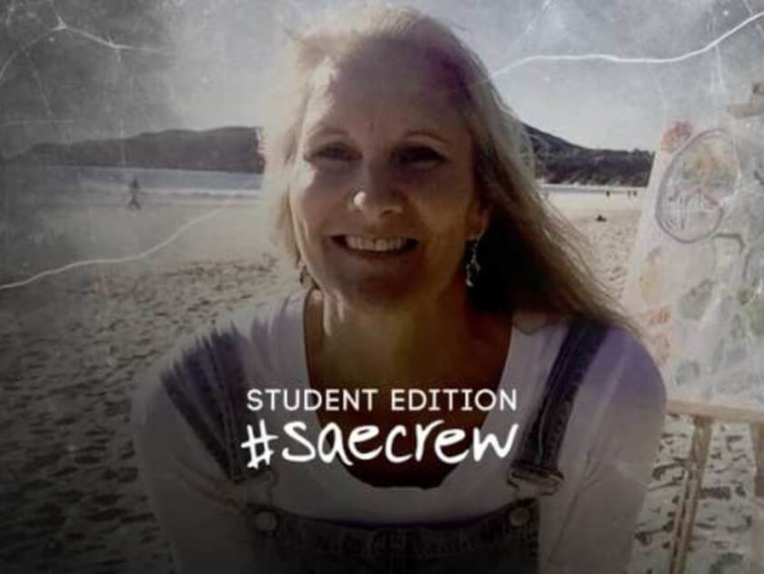 Woman smiling on the beach. Text reads Student Edition #SAEcrew. Roo Guthrie