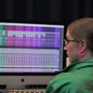 Bethan Maddison working on a sound program