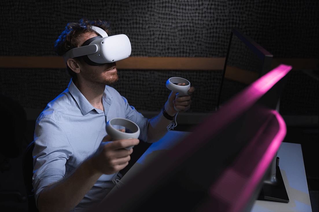 Man operating a VR set
