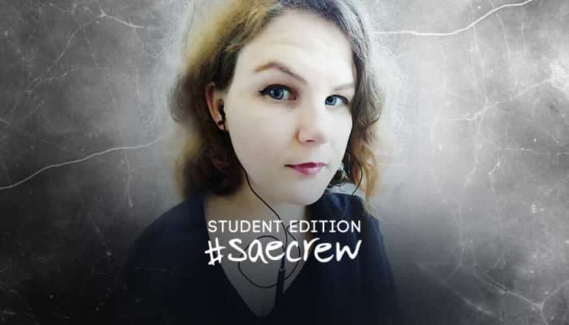 Selfie of woman wearing ear phones. Test reads Student edition SAECrew. Hayley Wilson