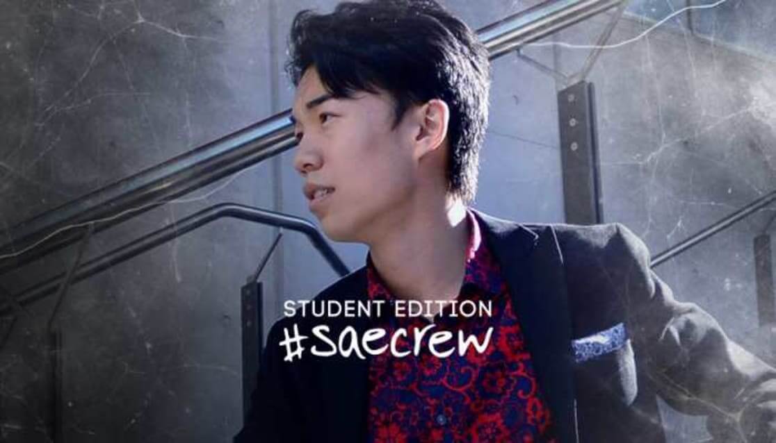 Student wearing blazer. Text reads Student Edition #saecrew