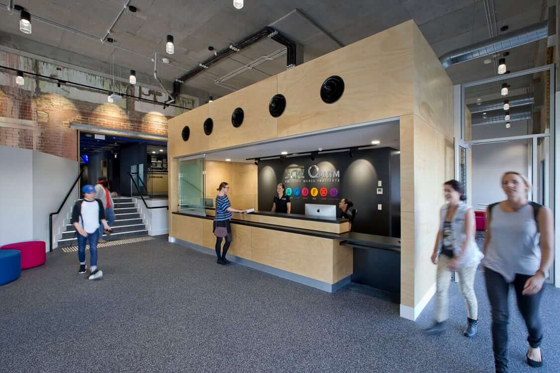 Students walking at reception area of SAE Perth Campus