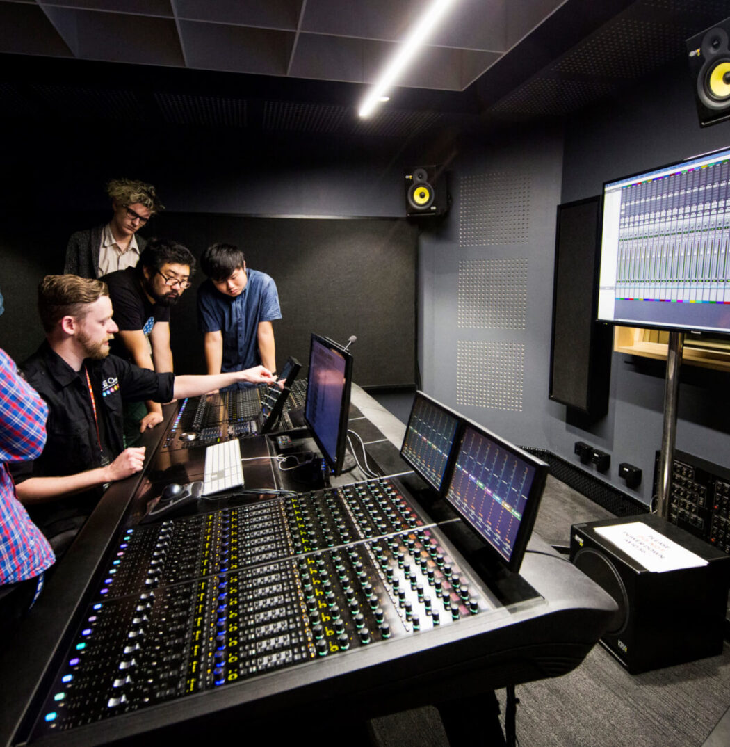 Audio Students and Lecturer in Post Production on Audio Desk