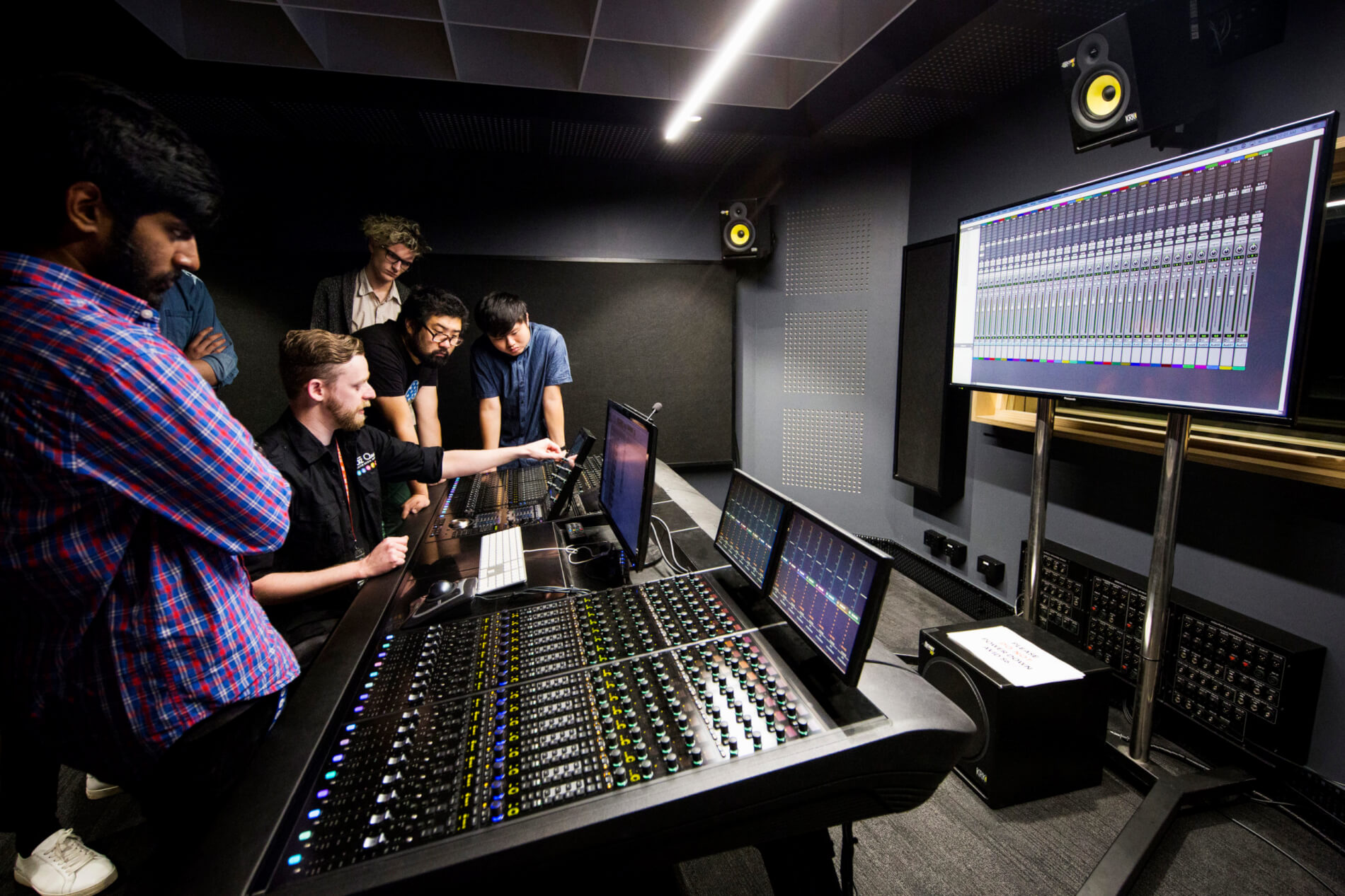 Audio Students and Lecturer in Post Production on Audio Desk