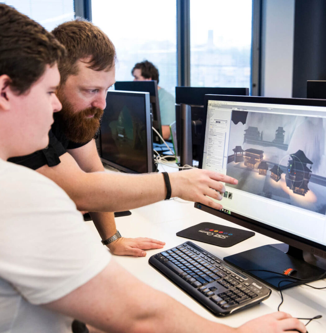 Student and Lecturer Discussing Games Design