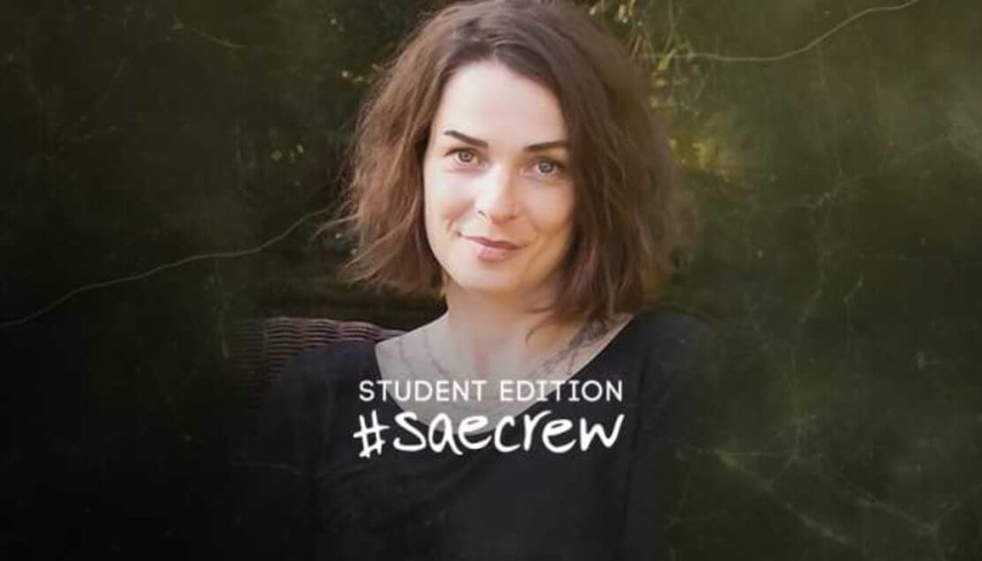 Woman with brown hair, in forest. Text reads Student Edition #SAEcrew. Carmen Goodwin