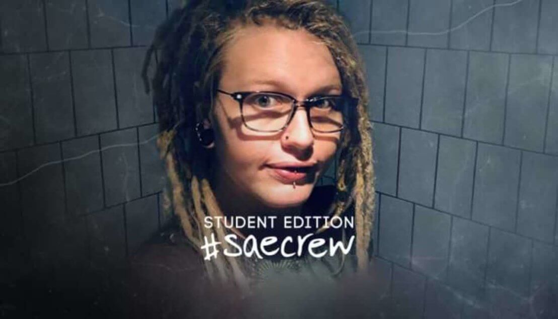 Student with dreadlocks and glasses, Text reads Student Edition #SAEcrew