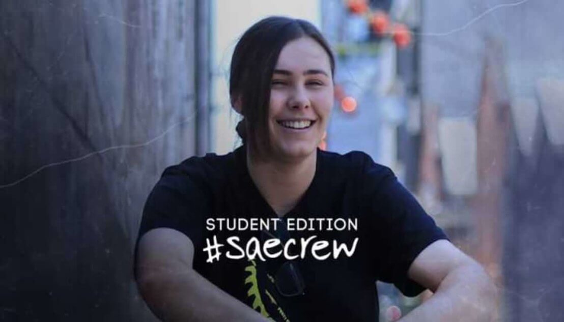Woman smiling wearing black tshirt. Text reads Student Edition #SAEcrew