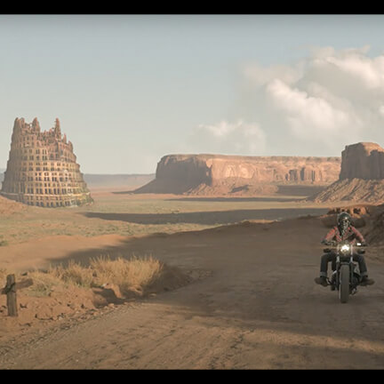 Person on motorcycle. Mountains in background. 3D Compositing by Phoenix Batchelor.