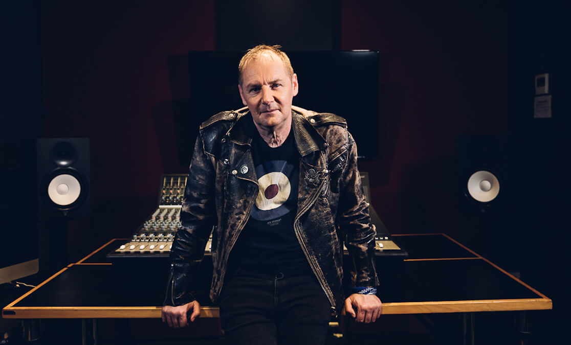 Adrian Carrol audio engineer, wearing leather jacket