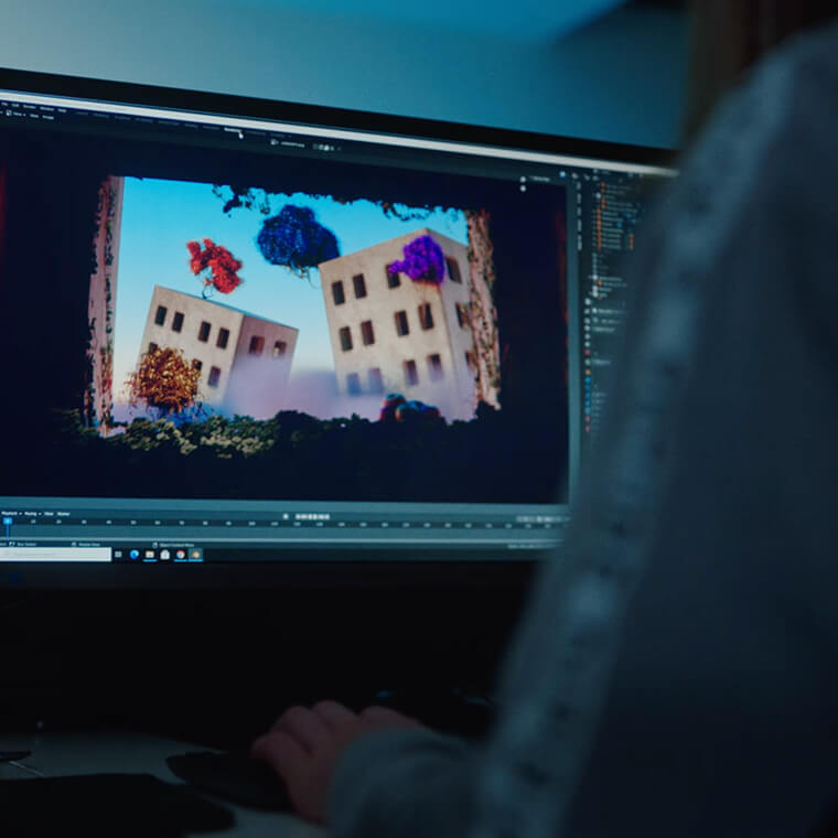 Person working on a digital animation on a desktop computer