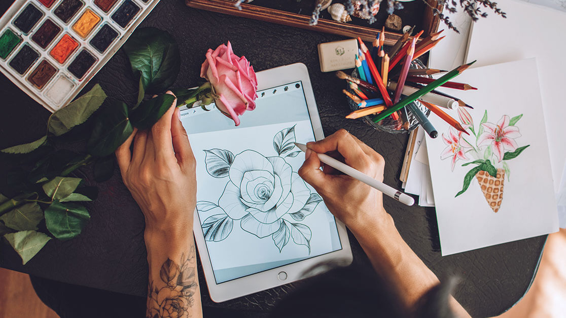 Student drawing flower on ipad