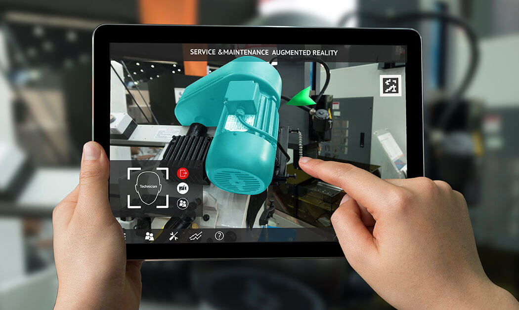Student working on a tablet using augmented reality