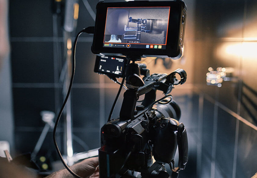 Film camera filming shower handle.