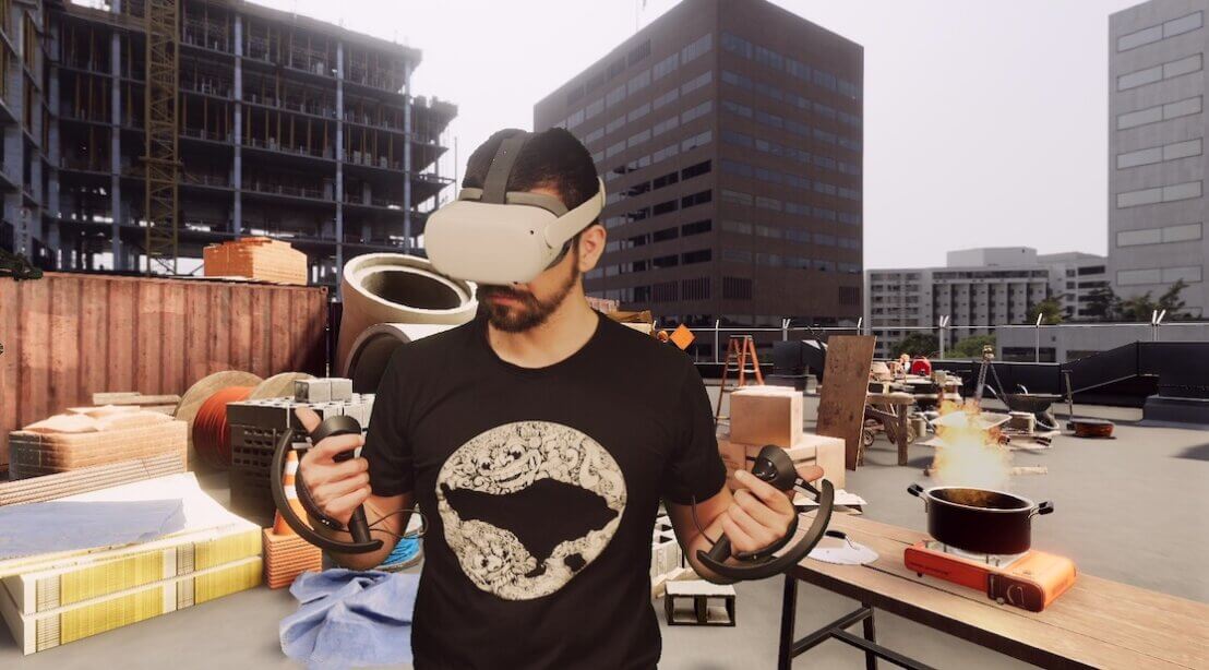 Man with VR headset on in computer generated building site