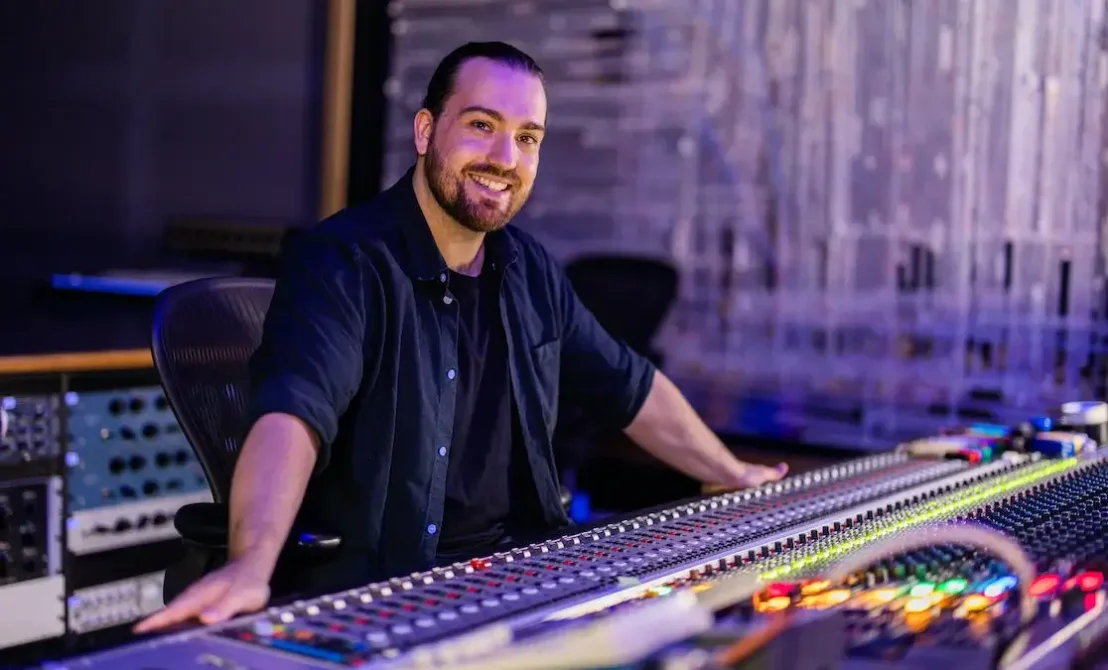 Tim Hacquoil, MCI student in an audio studio