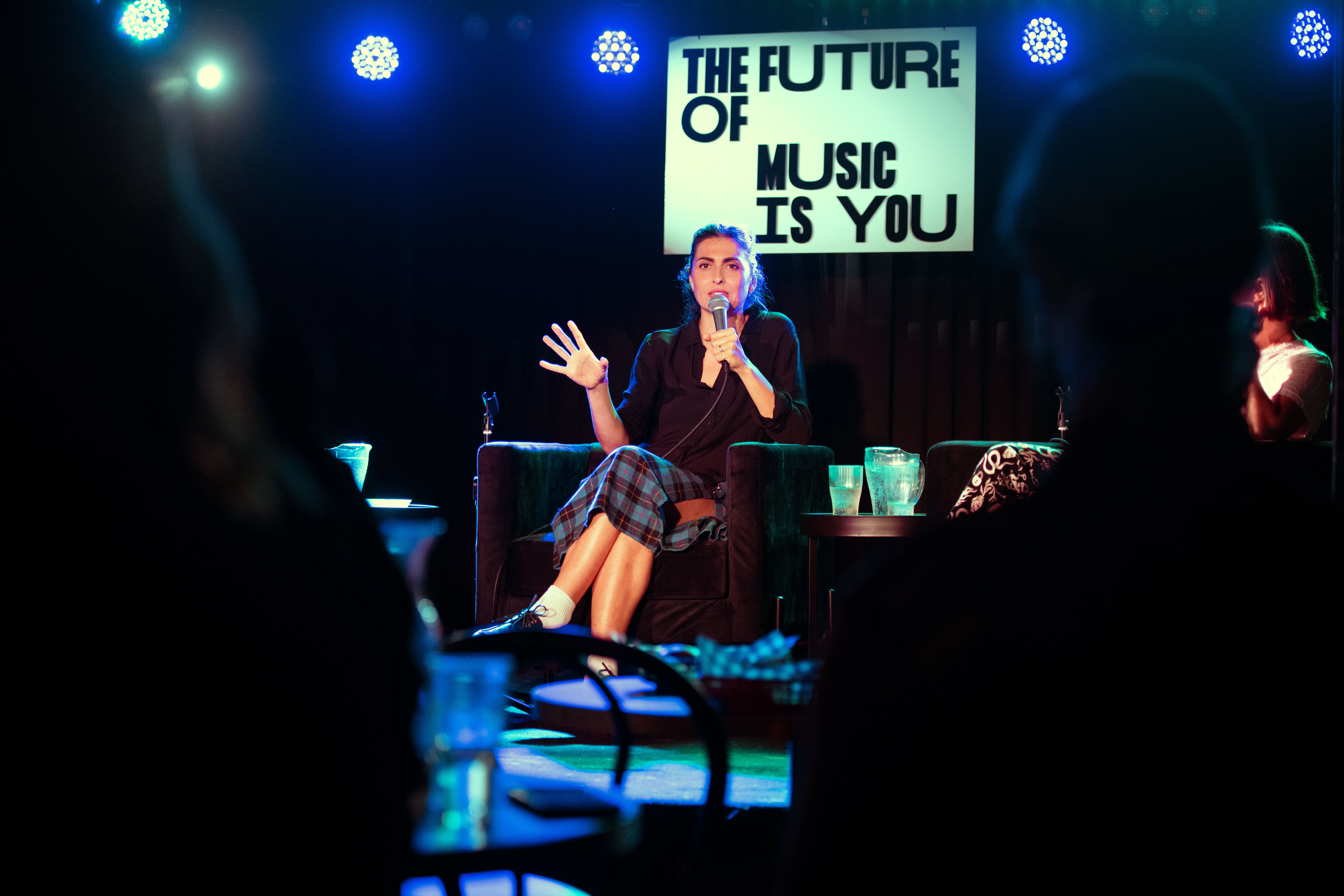DJ Anna Lunoe speaking at a masterclass event in Sydney (2024).