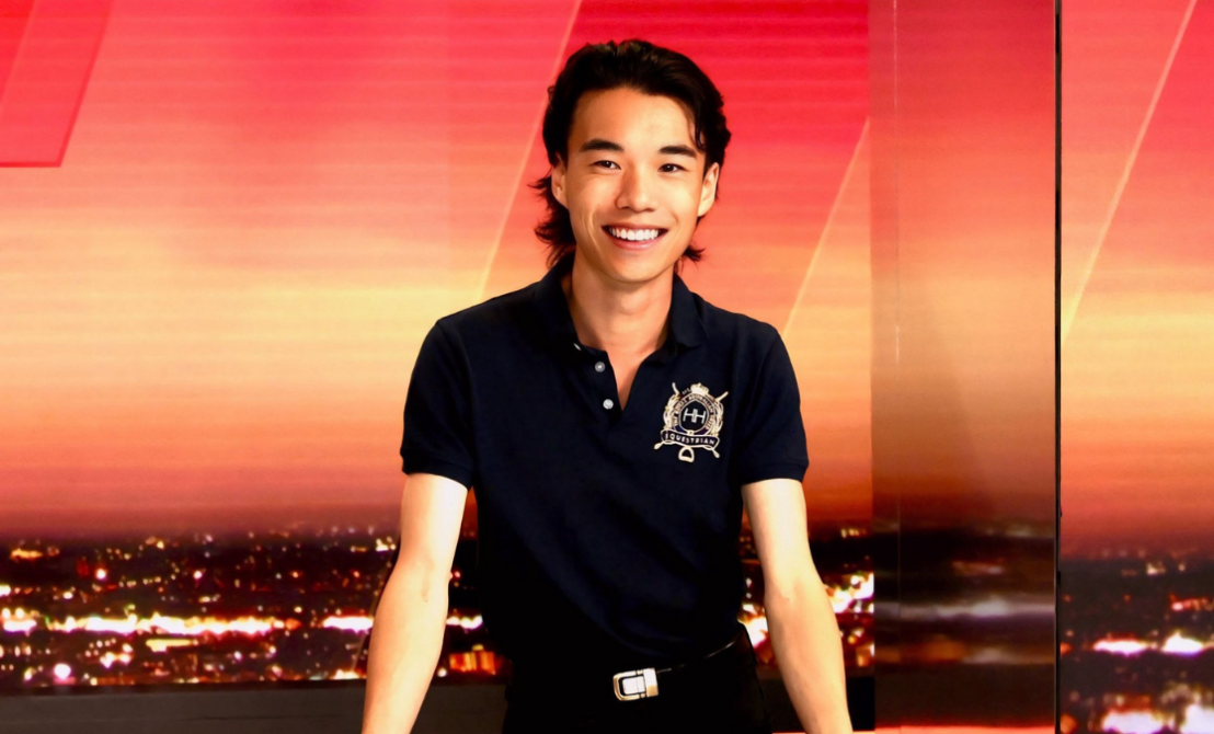 man in front of sunrise background