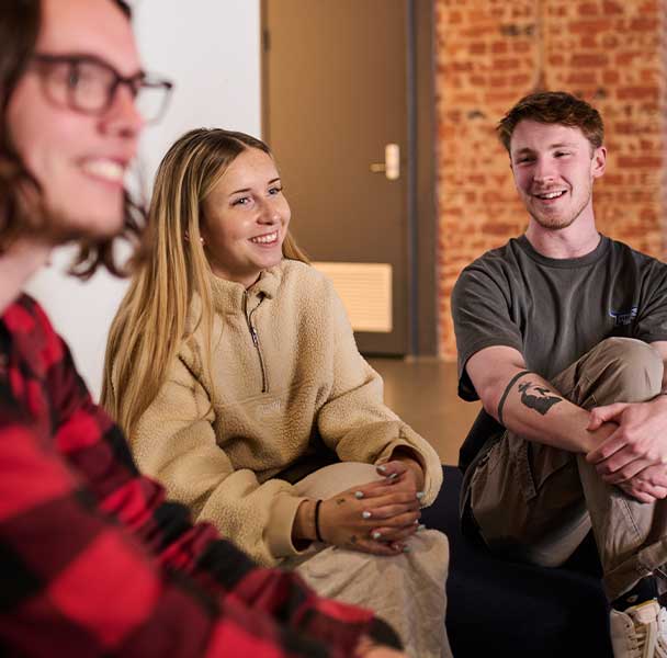 Students sitting around in an office space