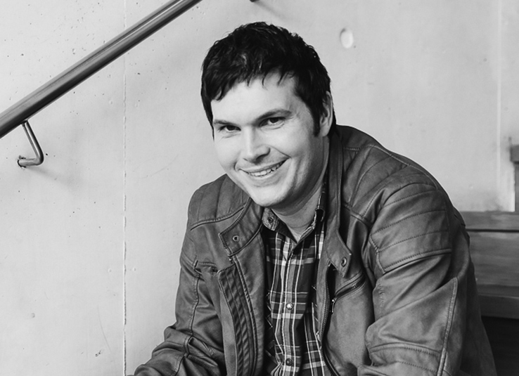 Profile photo of Nathan Jensen, SAE Games lecturer in greyscale