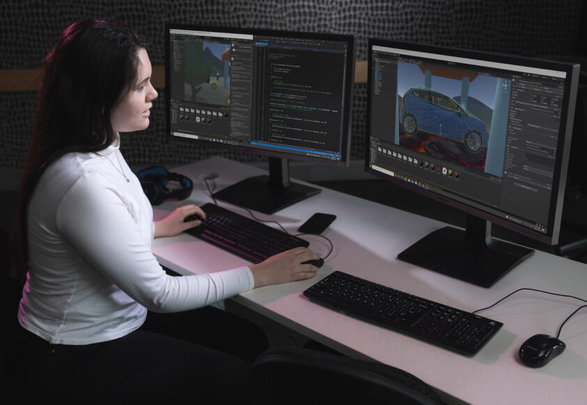 Female Student on Computer