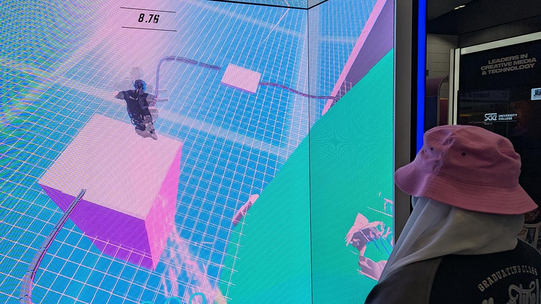 A young student playing a video game demo at Melbourne VCE & Careers Expo (1116x628)