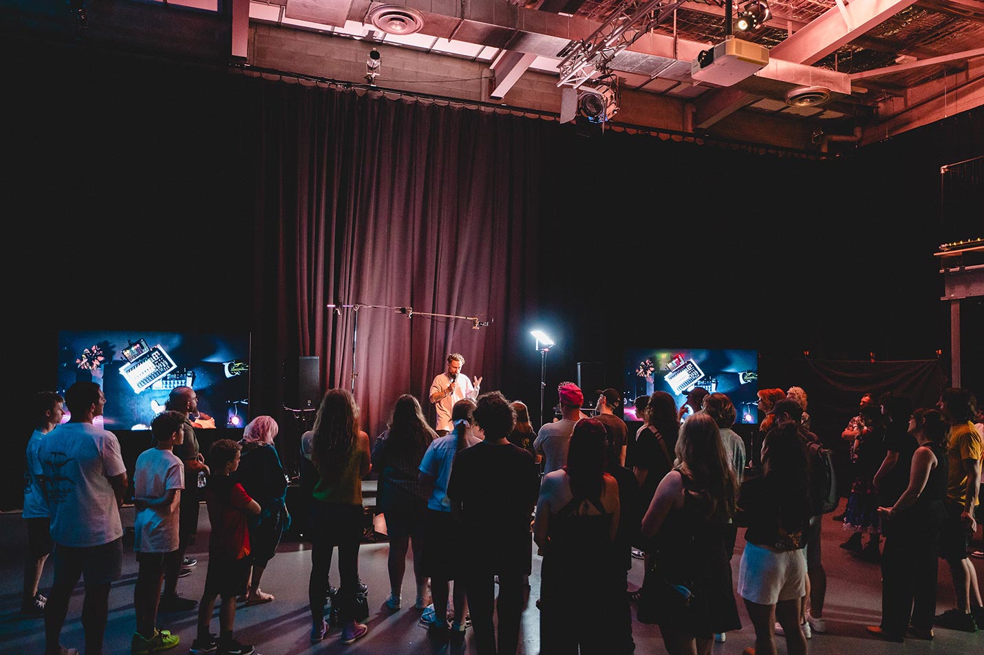 Electronic music producer and performer DubFX (Ben Stafford) speaking to a crowd at The Makers Series #5 - The Art of Live Looping event (1430x952)